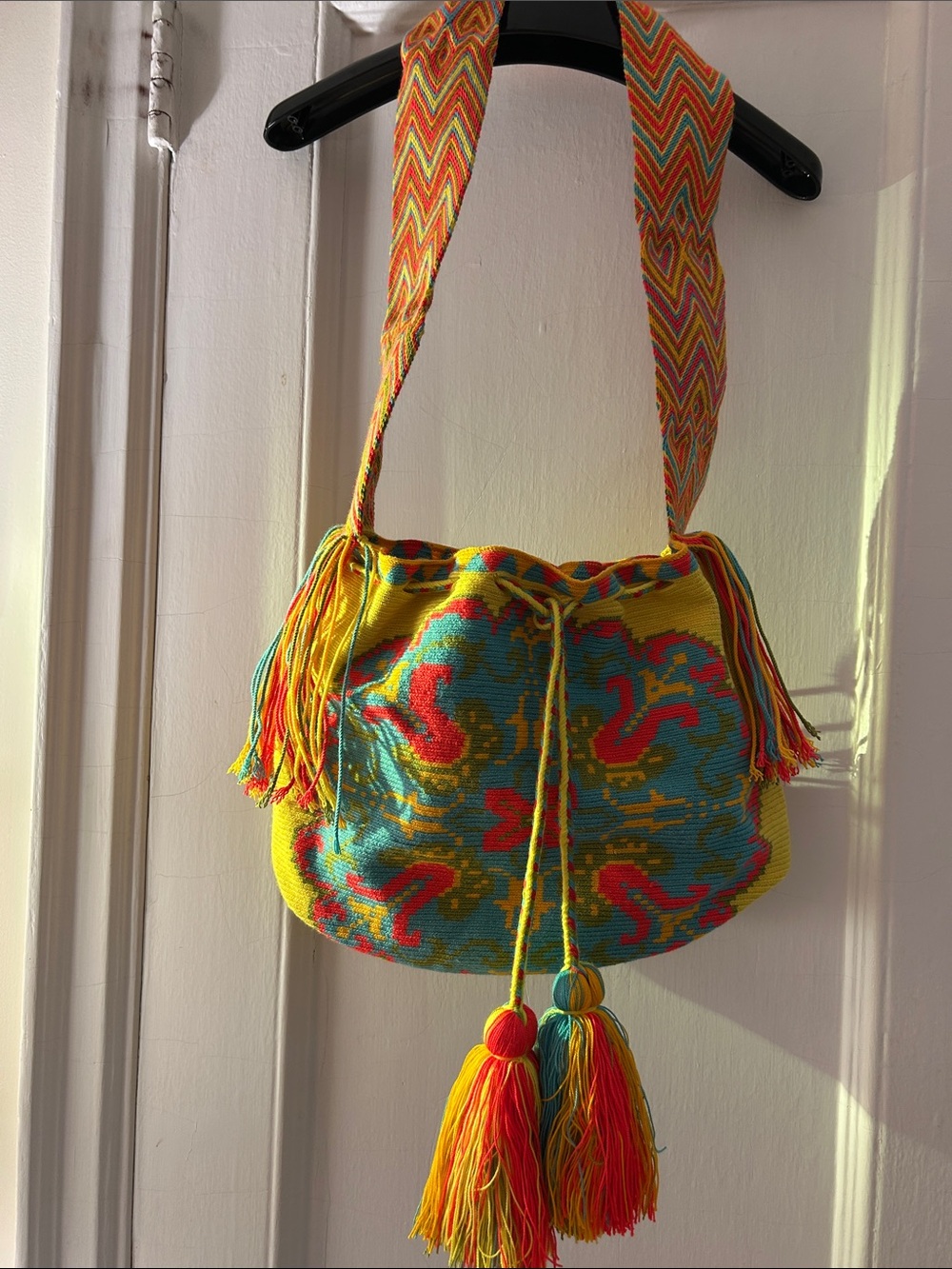 Handwoven orange, Yellow & Turquoise Bucket Bag with Multicolor Tassels